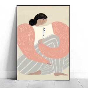 May include: A digital illustration of a person with long dark hair wearing a pink and white patterned shirt and gray striped pants. The person is sitting with their legs crossed and their arms wrapped around their body.