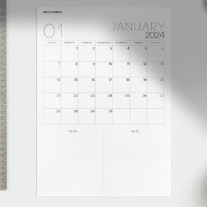 May include: A white printable calendar for January 2024 with a to-do list and notes section. The calendar has a simple design with black text and a gray border.