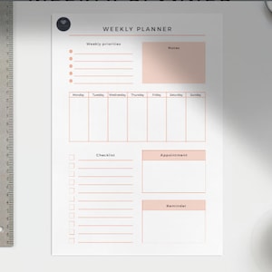 May include: A printable weekly planner with sections for weekly priorities, notes, a checklist, appointments, and reminders. The planner has a simple design with a light pink background and black text.
