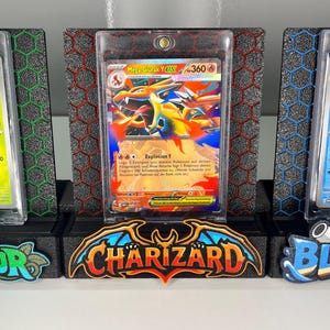 May include: Three trading card display stands featuring Bisaknosp, Mega Glurak Y-EX, and Wartortle cards in protective cases. Each stand has a hexagonal pattern background and a colorful base with the names Venusaur, Charizard, and Blastoise.