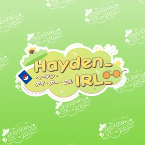 May include: A yellow cloud with the text "Hayden_IRL_" in a yellow font. The cloud has a white outline and a dotted border. The text "ヘーデン・アイ・アー・エル" is written in Japanese below the main text. A small blue square with a white Pokeball symbol is in the upper left corner of the cloud.