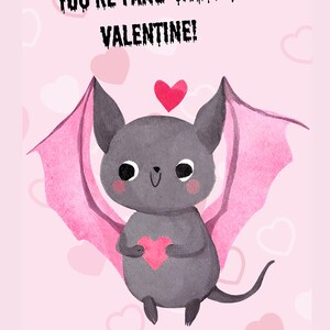 May include: A Valentine's Day card with a cute cartoon bat holding a pink heart. The bat has pink wings and is set against a pink background with heart shapes. The text reads, "YOU'RE FANG-TASTIC, VALENTINE!"