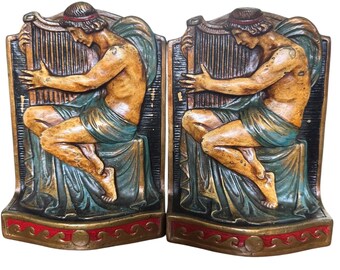 Antiek harnas bronzen harp boekensteunen 1922 figuratief klassiek polychroom paar