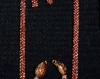 Kahealani all burgundy necklace set withbracelet & earrings. Puka shell, Hawaiian shell, Niihau shell