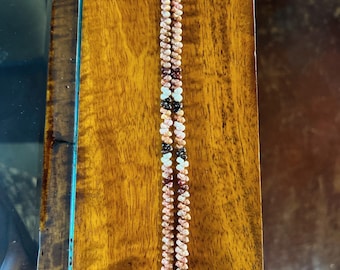 2 strand kahealani bracelet. same price for any length. specify length you want please?? kahealani#puka#hawaiian art#seashell#