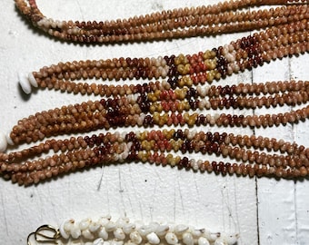 Kahealani shell 3 strand bracelets with bright colors. Shell jewelry. Hawaii shell jewelry. Shells. Kahealani shells. Jewelry. Puka shells.