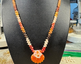 Exquisite RED sunrise Kahealani shell necklace, with colors that match the sunrise, Kahealani# puka# sunrise# hawaiian shells