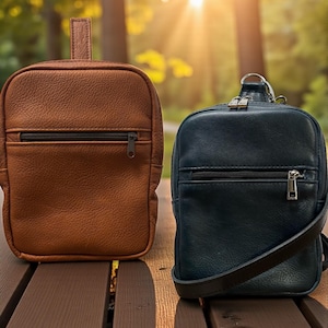 Leather concealed carry quick access pull tab slingbag.