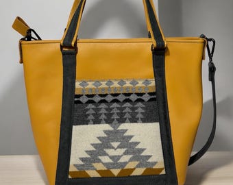 Bolso grande de cuero amarillo con bolsillo de lana