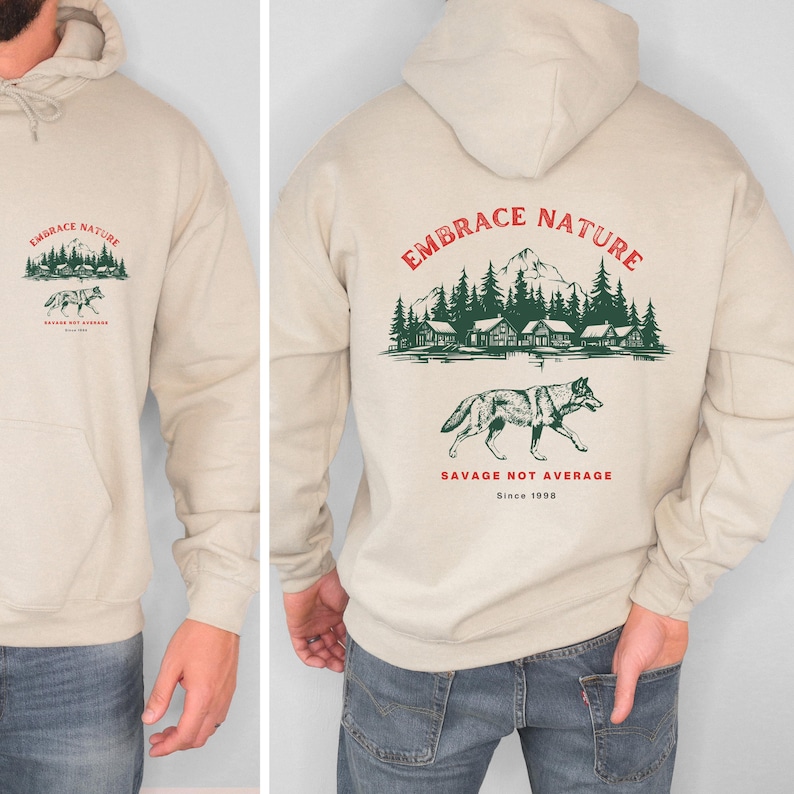Gemütliches Sweatshirt mit Wolfsmotiv, Outdoor-Bekleidung mit Wolfsprint, von der Natur inspirierter Hoodie, Geschenk für Naturliebhaber, Outdoor-Sportbekleidung. Bild 1