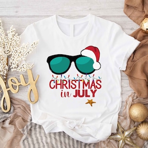 a t - shirt that says christmas in july