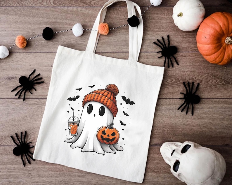 a white bag with a ghost holding a pumpkin
