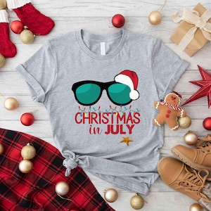 a t - shirt that says christmas in july
