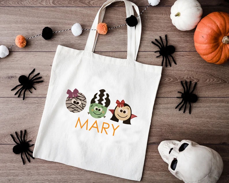 a trick or treat bag sitting on top of a wooden floor