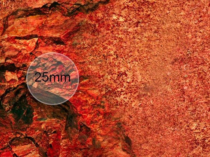May include: Close-up of a red and orange textured surface with a circle showing a 25mm measurement.