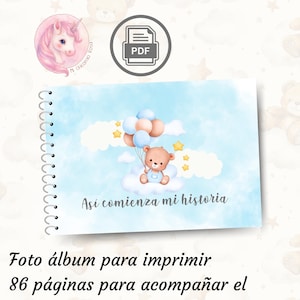 Puede incluir: Un álbum de fotos para bebés con encuadernación en espiral. La portada presenta una ilustración en acuarela de un osito de peluche sosteniendo globos sobre una nube, con el texto "Así comienza mi historia". Incluye un icono PDF y un logo de unicornio.