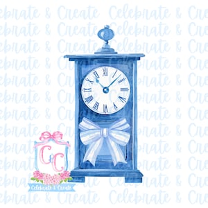 May include: A blue watercolor illustration of a clock with a white clock face and Roman numerals. The clock has a decorative bow and the text "Celebrate & Create". The clock is a decorative item.