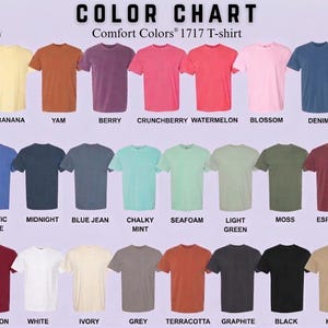 May include: A colour chart of Comfort Colors 1717 T-shirts, showcasing a variety of shades such as Banana, Yam, Berry, and Denim. The chart presents a spectrum of colours, from pale pink to dark green, each labelled for clarity.