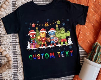 Custom Name Super Hero Christmas Shirt | New Year Super Hero Shirt | Custom Super Hero Christmas Tee | Gift for Christmas Birthday Party Tee