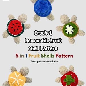 May include: Five crochet turtle toys with removable fruit shell patterns are displayed. The shells are designed to look like a watermelon, kiwi, orange, strawberry, and a blue shell. The image text says "Crochet Removable Fruit Shell Pattern".