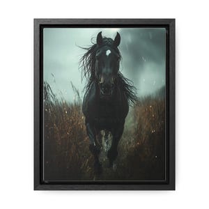 A powerful black horse gallops through a rain-soaked field, its mane flowing wildly, with a stormy sky and dark clouds in the background, captured in dramatic detail on a framed gallery canvas.