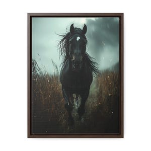 A powerful black horse gallops through a rain-soaked field, its mane flowing wildly, with a stormy sky and dark clouds in the background, captured in dramatic detail on a framed gallery canvas.