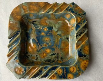 Ceramic square ashtray poured from vintage mold with copper blue crystal glaze slatted edges for cigars, cigarettes or candy dish
