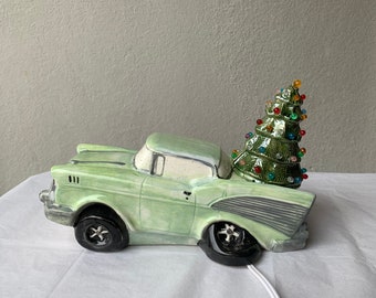 Ceramic Christmas Green w/gray trim 57 Chevy & with light up Ceramic Christmas Tree on Top w/ Multi colored Lights (with cord and bulb)