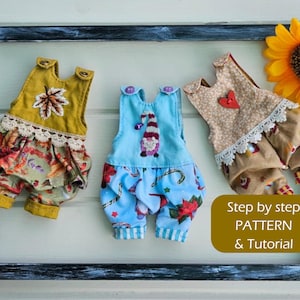 May include: Three doll-sized overalls hanging in a black frame. The overalls are made of different fabrics and have various embellishments, including a leaf, a heart, and a gnome. The text "Step by step PATTERN & Tutorial" is visible below the overalls.