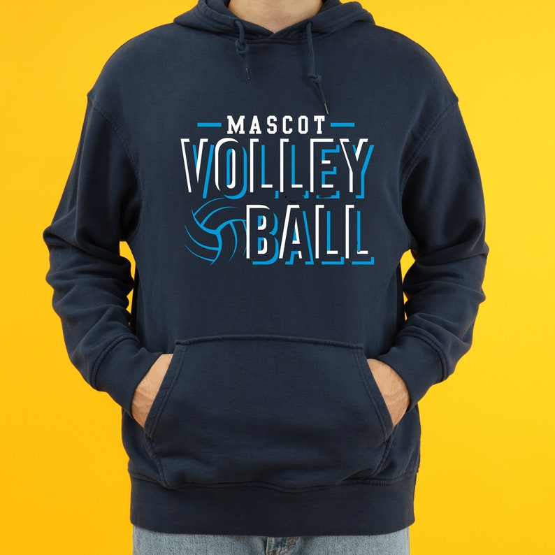 May include: A navy blue hoodie with a white graphic that says "MASCOT VOLLEYBALL" with a blue volleyball graphic.
