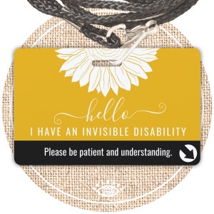 May include: Yellow lanyard with a black and yellow ID card that says "hello I HAVE AN INVISIBLE DISABILITY Please be patient and understanding." The card has a white sunflower graphic.