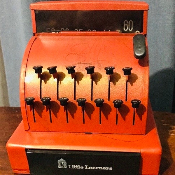 Little Learners Metal Cash Register. Still works. Buttons are fun to push!!! Lol!
