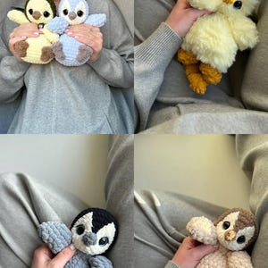May include: A collection of six plush stuffed animals made from soft yarn, including two small penguins in yellow and blue, a fluffy yellow chick, a grey and black penguin, and a light brown penguin, all featuring large dark eyes and textured bodies.
