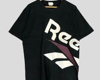 Vintage 90s Black Reebok International Ltd 1987 Graphic Print Tee Big Print Tag Reebok Athletic Sports T-Shirt Size L