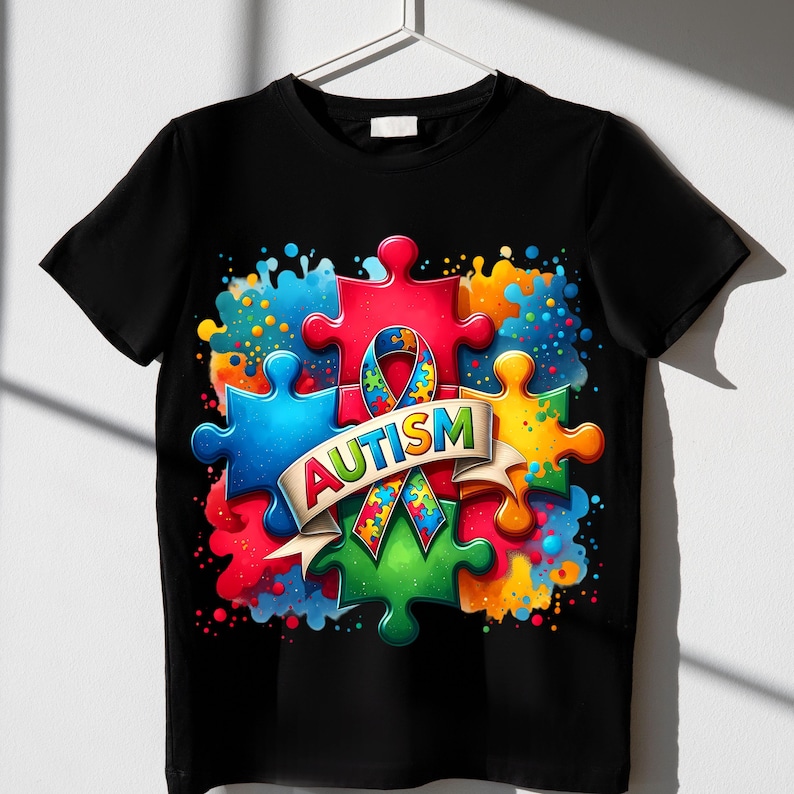 May include: Black t-shirt with a colorful puzzle piece design and a ribbon with the word "AUTISM" on it.