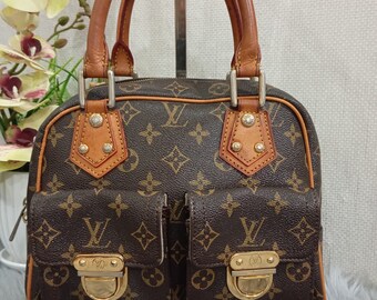 Monogramma con manico superiore della borsa Manhattan di Louis Vuitton