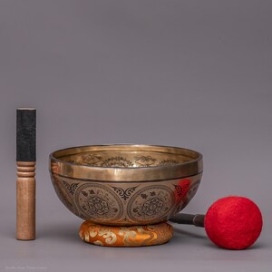 Hand-Carved Tibetan Singing Bowl: Seven Chakra Sound Bowl with Striker