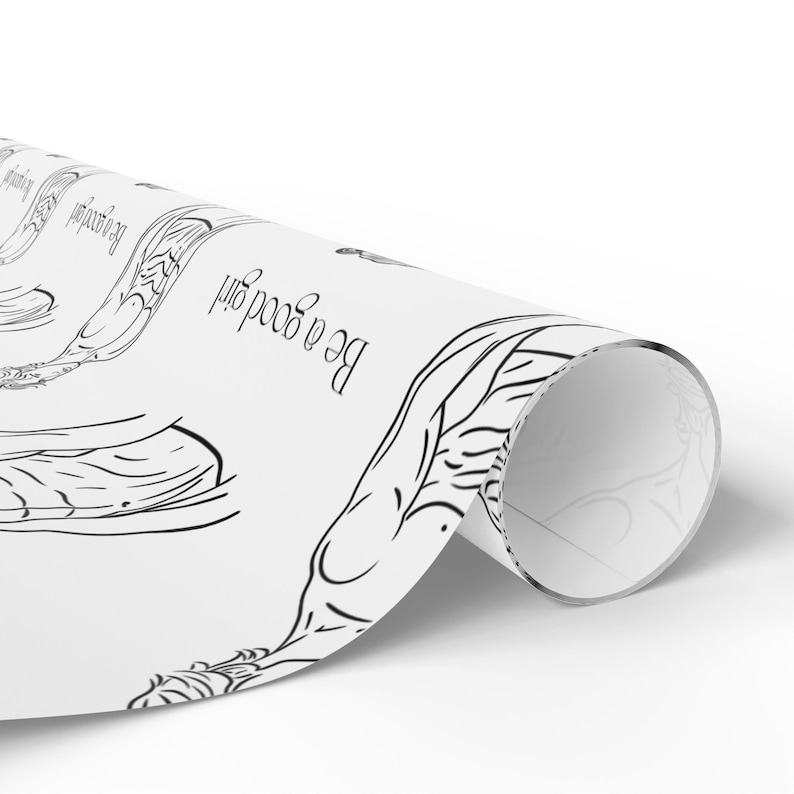 May include: White wrapping paper featuring a black line drawing of a figure and the words "Be a good girl". The paper is rolled, revealing both the printed side and the plain white interior.