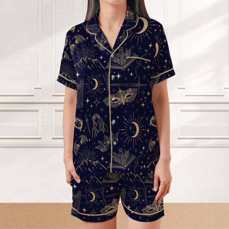 Navy blue summer pajama set for women with a whimsical book lover design, celestial fantasy print on soft satin fabric