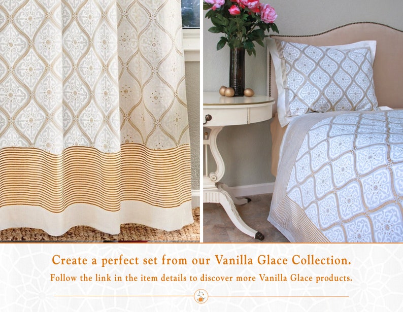 May include: A white and gold patterned curtain with a gold striped bottom border. The same pattern is featured on a white and gold bedspread and pillow. The text "Create a perfect set from our Vanilla Glace Collection. Follow the link in the item details to discover more Vanilla Glace products." is displayed below the image.