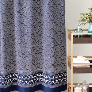 May include: A navy blue shower curtain with a white wave pattern. The bottom border features a white wave design.