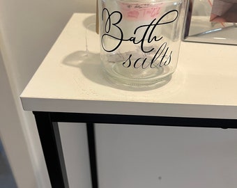 Glass bath salts jar with spoon