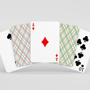 May include: Four playing cards fanned out, showing the Ace of Diamonds, the 2 of Spades, the 10 of Clubs, and the back of a card with a green and orange plaid pattern.