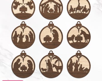 May include: Set of nine brown wooden Christmas ornament cutouts featuring a nativity scene with the baby Jesus, Mary, Joseph, and animals. The ornaments are designed to be cut out with a Cricut machine.