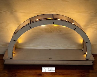 May include: A light-colored wooden arch structure with a flat rectangular base, featuring integrated warm yellow LED string lights along the inner curve. The object includes a small white rectangular label with the text Digital Download.