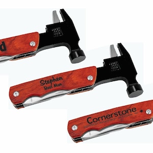 May include: Three multi-tool hammers with wooden handles. The handles are engraved with the words "Dad", "Stephen Best Man", and "Cornerstone Equipment Management Services, LLC".