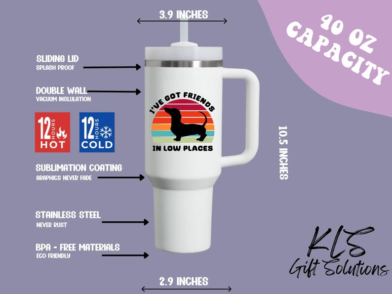 May include: White insulated tumbler with a handle, featuring a dachshund silhouette against a sunset design and the text "I've Got Friends in Low Places." It has a 40 oz capacity, is 10.5 inches tall, and 3.9 inches wide. The tumbler is made of stainless steel.