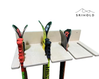 Wooden ski holder for storing skis on the wall - The ski wall holder is used to store all your equipment and poles