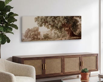 May include: A sepia-toned landscape print featuring a large, mature tree with sprawling branches and lush foliage. The artwork depicts a serene forest scene with other trees in the background, creating a sense of depth and tranquility. The print is mounted on a wall above a wooden cabinet.
