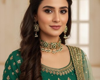 Rajwari kundan choker with emerald stone, enamel work and earrings